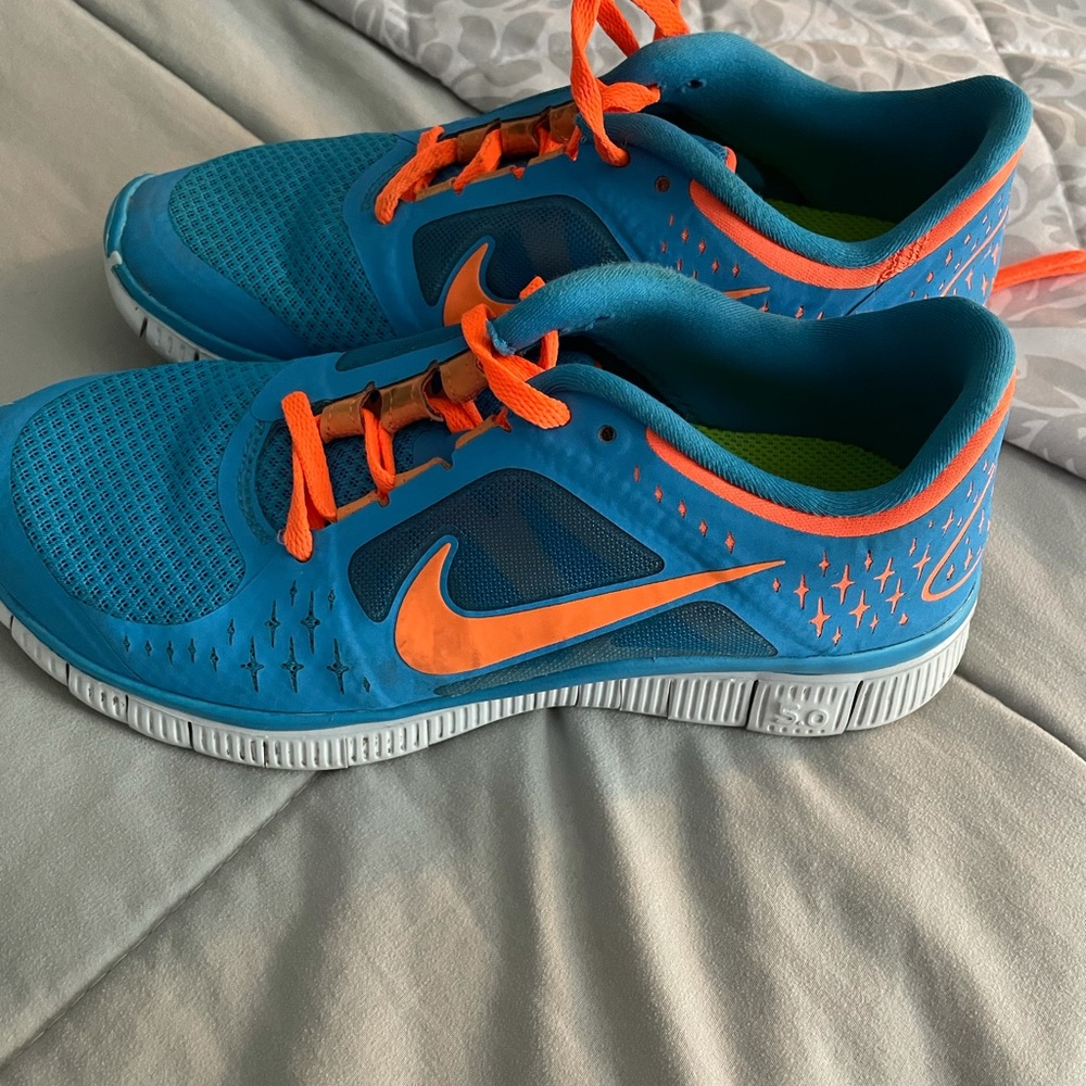 Nike free run shoes. Blue and orange